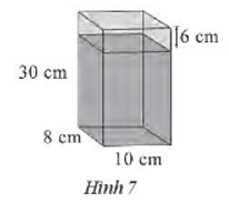 Một bình hình lăng trụ có kích thước đáy và chiều cao như Hình 7. Nam đổ vào đó một lượng nước