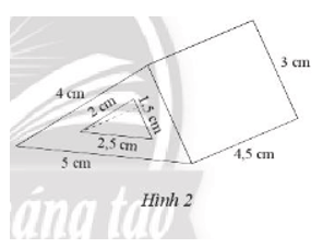 Một khối kim loại có dạng hình lăng trụ đứng đáy tam giác vuông có kích thước hai cạnh góc vuông